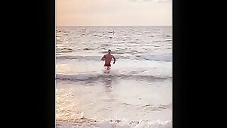 Bodybuilder Logan Foote emerging from the ocean 🌊