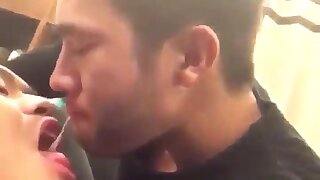 Two men with killer cheekbones make out