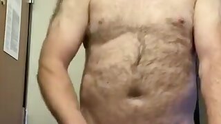 Hairy dad releases a week old load.