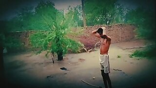 Pakistani dude standing outdoor durring rain