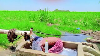 Pakistani bathing in tubewell with semihard dick
