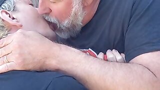 Young men smell his bear daddy and kiss