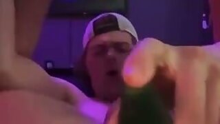 Cute white guy wearing Converse sneakers fucks his own hole with what looks like a long cucumber