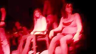 Shy woman gets a sexy dance from a male stripper