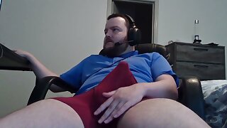 He jerks off his bulge though his boxer briefs until taking it off and jerks off his hard dick