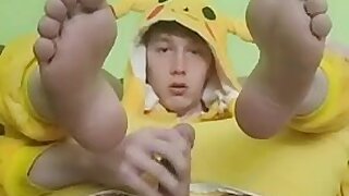 Hot twink in a picachu onesie shows it all off!